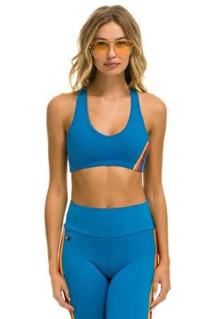 WOMEN'S 5 STRIPE V-CUT SPORTS BRA - CARRIBEAN